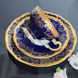 gilded cup and saucer