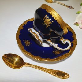 gilded cup and saucer