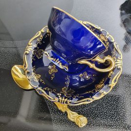 gilded cup and saucer