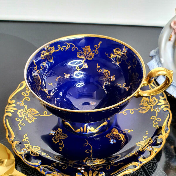 gilded cup and saucer