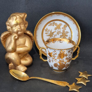 gilded cup and saucer