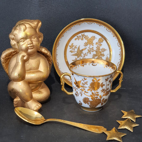 gilded cup and saucer