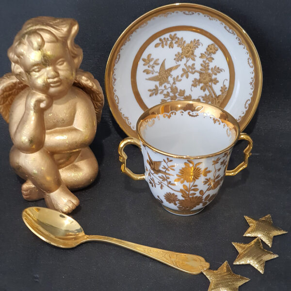 gilded cup and saucer