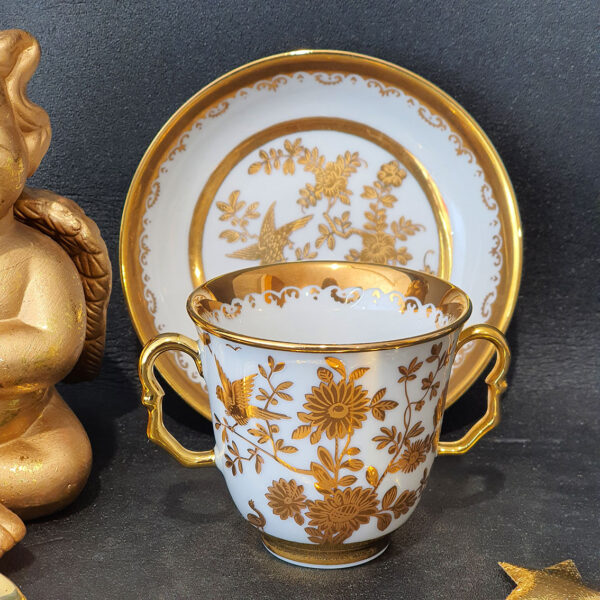 gilded cup and saucer