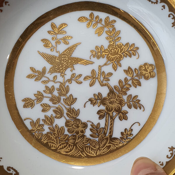 gilded cup and saucer