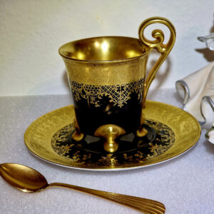 gilded cup and saucer