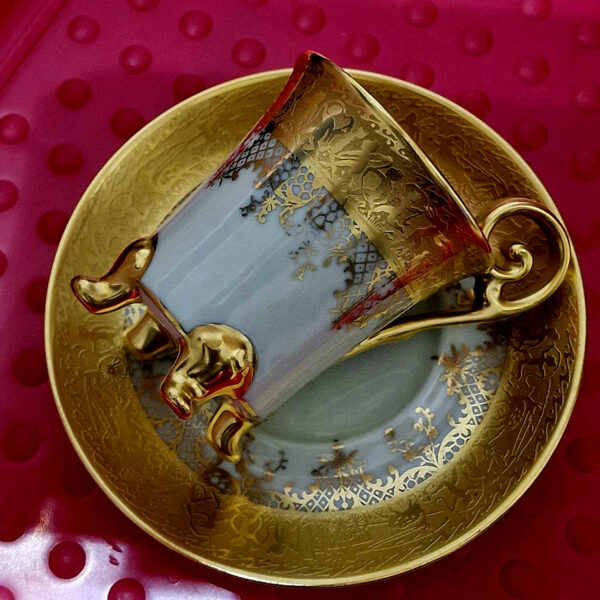 gilded cup and saucer