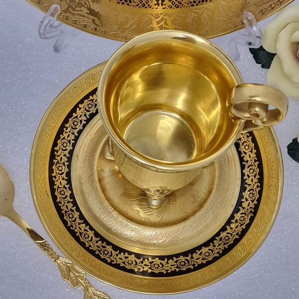 gilded cup and saucer